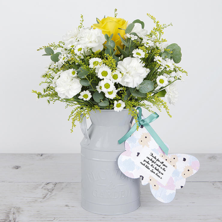 Flowerchurn with Yellow Roses, Solidago, Chrysanthemums, Carnations and Eucalyptus image