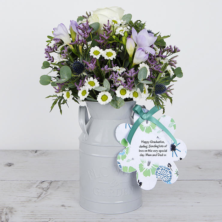 Dutch Roses, Purple Freesias, Blue Eryngiums and Lilac Limonium with Eucalyptus in our Keepsake Flowerchurns image