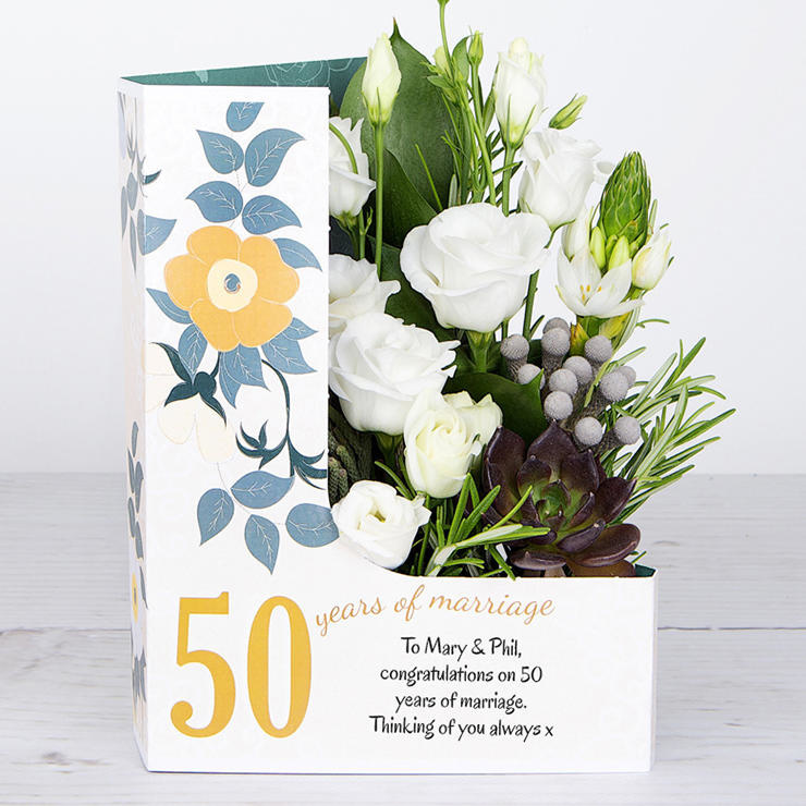 50 Years Of Marriage Celebration Flowercard with White Lisianthus, Berry Jewels, Sprigs of Rosemary and Ornithogalum image