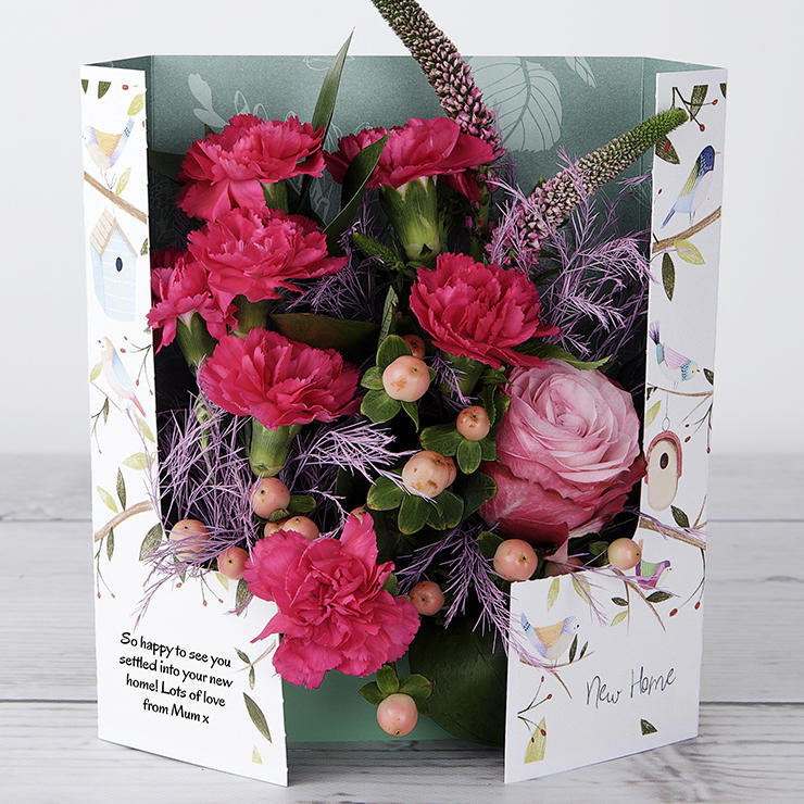 New Home Congratulation Flowers with Dutch Rose, Veronica, Spray Carnations, Hypericum, Tree Fern and Ruscus image